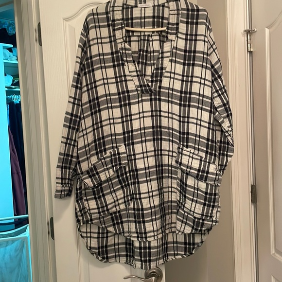 Free People lack and white tunic. Looks great with knees high boots or leggings